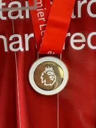 Creative Commons. Medalla Premier League